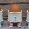 Pink-footed walking egg cup